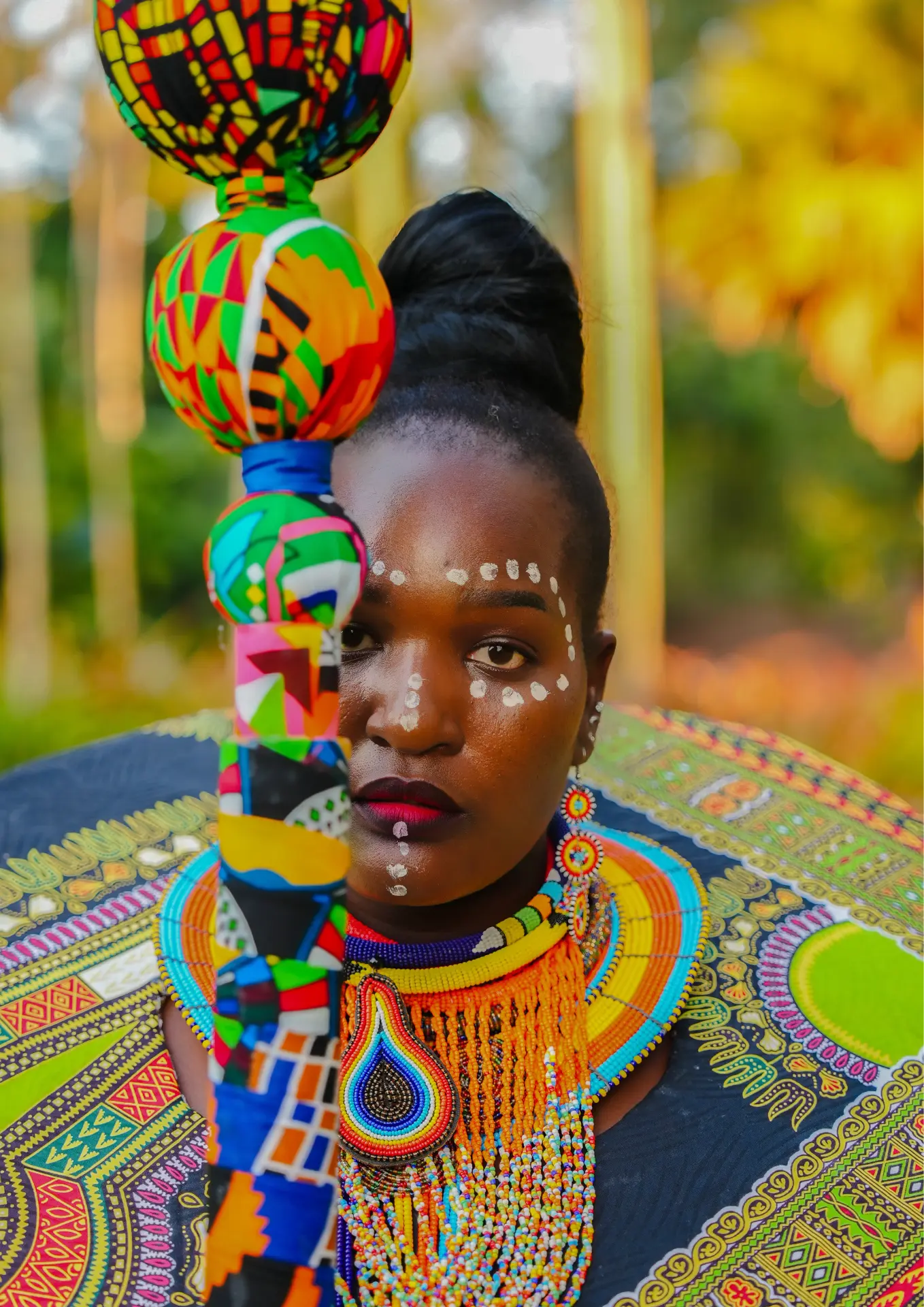 Linda, founder and designer of The Monzaley, in vibrant African-inspired headwrap and beadwork